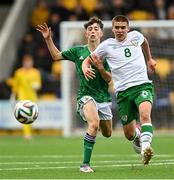 22 October 2021; Anthony Dodd of Republic of Ireland in action against Ryan Donnelly of Northern Ireland during the Victory Shield match between Northern Ireland and Republic of Ireland at Blanchflower Park in Belfast. Photo by Ramsey Cardy/Sportsfile