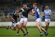 23 October 2021; Mark Donnellan of Maynooth in action against James Burke of Naas during the Kildare County Senior Club Football Championship Semi-Final match between Naas and Maynooth at St Conleth's Park in Newbridge, Kildare. Photo by Harry Murphy/Sportsfile