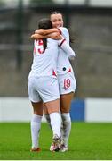 23 October 2021; Deearna Goodwin of England celebrates with team-mate Grace Clinton after scoring her side's second goal during the UEFA Women's U19 Championship Qualifier match between England and Northern Ireland at Jackman Park in Limerick. Photo by Eóin Noonan/Sportsfile