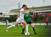 23 October 2021; Deearna Goodwin of England in action against Ella Haughey of Northern Ireland during the UEFA Women's U19 Championship Qualifier match between England and Northern Ireland at Jackman Park in Limerick. Photo by Eóin Noonan/Sportsfile