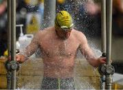 23 October 2021; John Monaghan from Ballyfermot, in Dublin, takes a shower after competing in the 101st Jones Engineering Dublin City Liffey Swim which travelled up-river for the first time in the swim’s history. Photo by Ray McManus/Sportsfile