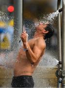 23 October 2021; Noel Kelly from Howth, in Dublin, takes a shower after competing in the 101st Jones Engineering Dublin City Liffey Swim which travelled up-river for the first time in the swim’s history. Photo by Ray McManus/Sportsfile