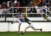 23 October 2021; Eamonn Callaghan of Naas scores a point under pressure from Callum McCabe of Maynooth during the Kildare County Senior Club Football Championship Semi-Final match between Naas and Maynooth at St Conleth's Park in Newbridge, Kildare. Photo by Harry Murphy/Sportsfile