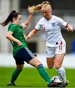 23 October 2021; Freya Gregory of England in action against Darcy Boyle of Northern Ireland during the UEFA Women's U19 Championship Qualifier match between England and Northern Ireland at Jackman Park in Limerick. Photo by Eóin Noonan/Sportsfile