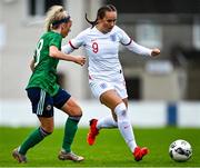 23 October 2021; Lucy Watson of England in action against Ellie-Mae Dickson of Northern Ireland during the UEFA Women's U19 Championship Qualifier match between England and Northern Ireland at Jackman Park in Limerick. Photo by Eóin Noonan/Sportsfile