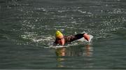 23 October 2021; Tiernan Brennan, Clontarf, who was the first over the finish line, in the 101st Jones Engineering Dublin City Liffey Swim which travelled up-river for the first time in the swim’s history. Photo by Ray McManus/Sportsfile