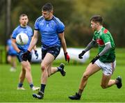 23 October 2021; Brian McDermott of Westport St Patrick's in action against Conor McStay of Ballina Stephenites during the Mayo County Senior Club Football Championship Quarter-Final match between Westport St Patrick's and Ballina Stephenites at Connacht GAA Centre in Bekan, Mayo. Photo by Matt Browne/Sportsfile