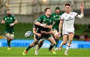 23 October 2021; Jack Carty of Connacht loses possession after a tackle by David McCann of Ulster during the United Rugby Championship match between Connacht and Ulster at Aviva Stadium in Dublin. Photo by Brendan Moran/Sportsfile