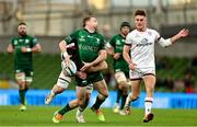 23 October 2021; Jack Carty of Connacht loses possession after a tackle by David McCann of Ulster during the United Rugby Championship match between Connacht and Ulster at Aviva Stadium in Dublin. Photo by Brendan Moran/Sportsfile
