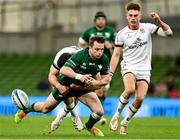 23 October 2021; Jack Carty of Connacht loses possession after a tackle by David McCann of Ulster during the United Rugby Championship match between Connacht and Ulster at Aviva Stadium in Dublin. Photo by Brendan Moran/Sportsfile