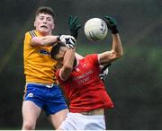 23 October 2021; Jason Gibbons of Ballintubber in action against Connell Dempsey of Knockmore during the Mayo County Senior Club Football Championship Quarter-Final match between Ballintubber and Knockmore at Connacht GAA Centre in Bekan, Mayo. Photo by Matt Browne/Sportsfile