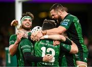 23 October 2021; Mack Hansen of Connacht second from left is congratulated by team-mates after scoring his side's second try during the United Rugby Championship match between Connacht and Ulster at Aviva Stadium in Dublin. Photo by David Fitzgerald/Sportsfile