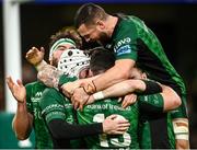 23 October 2021; Mack Hansen of Connacht second from left is congratulated by team-mates after scoring his side's second try during the United Rugby Championship match between Connacht and Ulster at Aviva Stadium in Dublin. Photo by David Fitzgerald/Sportsfile