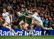 23 October 2021; Tiernan O’Halloran of Connacht beats the tackle from James Hume of Ulster during the United Rugby Championship match between Connacht and Ulster at Aviva Stadium in Dublin. Photo by David Fitzgerald/Sportsfile
