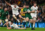 23 October 2021; Matthew Burke of Connacht beats the tackles of Rob Herring and Nick Timoney of Ulster during the United Rugby Championship match between Connacht and Ulster at Aviva Stadium in Dublin. Photo by Brendan Moran/Sportsfile