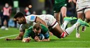 23 October 2021; John Porch of Connacht scores his side's third try despite the efforts of Robert Baloucoune of Ulster during the United Rugby Championship match between Connacht and Ulster at Aviva Stadium in Dublin. Photo by Brendan Moran/Sportsfile