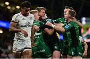 23 October 2021; John Porch of Connacht celebrates with team-mates Conor Fitzgerald, Mack Hansen and Kieron Marmion after scoring their side's third try during the United Rugby Championship match between Connacht and Ulster at Aviva Stadium in Dublin. Photo by Brendan Moran/Sportsfile