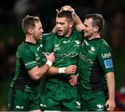 23 October 2021; Diarmuid Kilgallen of Connacht celebrates with team-mates Kieron Marmion, left, and  Jack Carty, right, after scoring their side's fourth try during the United Rugby Championship match between Connacht and Ulster at Aviva Stadium in Dublin. Photo by Brendan Moran/Sportsfile