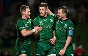23 October 2021; Diarmuid Kilgallen of Connacht celebrates with team-mates Kieron Marmion, left, and Jack Carty, right, after scoring their side's fourth try during the United Rugby Championship match between Connacht and Ulster at Aviva Stadium in Dublin. Photo by Brendan Moran/Sportsfile