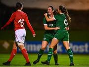 23 October 2021; Emma Bucci, left, celebrates with Republic of Ireland team-mate Rebecca Watkins after scoring her side's first goal during the UEFA Women's U19 Championship Qualifier match between Switzerland and Republic of Ireland at Markets Field in Limerick. Photo by Eóin Noonan/Sportsfile