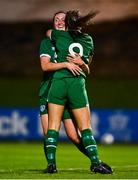 23 October 2021; Emma Bucci, left, celebrates with Republic of Ireland team-mate Rebecca Watkins after scoring her side's first goal during the UEFA Women's U19 Championship Qualifier match between Switzerland and Republic of Ireland at Markets Field in Limerick. Photo by Eóin Noonan/Sportsfile