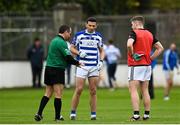 23 October 2021; Nass captain Eamonn Callaghan watches referee Niall Colgan toss the coin before the Kildare County Senior Club Football Championship Semi-Final match between Naas and Maynooth at St Conleth's Park in Newbridge, Kildare. Photo by Harry Murphy/Sportsfile