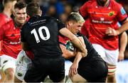 23 October 2021; Dan Goggin of Munster is tackled by Stephen Myler of Ospreys during the United Rugby Championship match between Ospreys and Munster at Liberty Stadium in Swansea, Wales. Photo by Ben Evans/Sportsfile