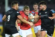 23 October 2021; Craig Casey of Munster is tackled by Rhys Webb of Ospreys, left, during the United Rugby Championship match between Ospreys and Munster at Liberty Stadium in Swansea, Wales. Photo by Ben Evans/Sportsfile