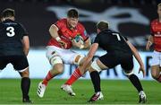 23 October 2021; Jack O’Donoghue of Munster is tackled by Jac Morgan of Ospreys during the United Rugby Championship match between Ospreys and Munster at Liberty Stadium in Swansea, Wales. Photo by Ben Evans/Sportsfile