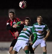 23 October 2021; Danny Mandroiu of Shamrock Rovers in action against Aaron Robinson of Longford Town during the SSE Airtricity League Premier Division match between Longford Town and Shamrock Rovers at Bishopsgate in Longford. Photo by Seb Daly/Sportsfile