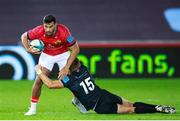 23 October 2021; Damian de Allende of Munster is tackled by Max Nagy of Ospreys during the United Rugby Championship match between Ospreys and Munster at Liberty Stadium in Swansea, Wales. Photo by Gruffydd Thomas/Sportsfile