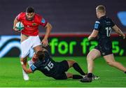 23 October 2021; Damian de Allende of Munster is tackled by Max Nagy of Ospreys during the United Rugby Championship match between Ospreys and Munster at Liberty Stadium in Swansea, Wales. Photo by Gruffydd Thomas/Sportsfile