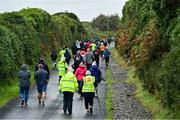 23 October 2021; Parkrun Ireland in partnership with Vhi, added a new parkrun at Achill Greenway on Saturday, 23rd of October, with the introduction of the Achill Greenway parkrun at Achill Greenway, Great Western Greenway in Achill, Mayo. Parkruns take place over a 5km course weekly, are free to enter and are open to all ages and abilities, providing a fun and safe environment to enjoy exercise. To register for a parkrun near you visit www.parkrun.ie. Pictured are participants at the start of the parkrun. Photo by Brendan Moran/Sportsfile