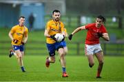 23 October 2021; Kevin McLoughlin of Knockmore in action against Kealan McDonnell of Ballintubber during the Mayo County Senior Club Football Championship Quarter-Final match between Ballintubber and Knockmore at Connacht GAA Centre in Bekan, Mayo. Photo by Matt Browne/Sportsfile