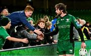 23 October 2021; Mack Hansen of Connacht high fives supporters after the United Rugby Championship match between Connacht and Ulster at Aviva Stadium in Dublin. Photo by Brendan Moran/Sportsfile