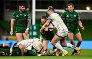 23 October 2021; Kieran Marmion of Connacht is tackled by Stuart McCloskey of Ulster during the United Rugby Championship match between Connacht and Ulster at Aviva Stadium in Dublin. Photo by Brendan Moran/Sportsfile