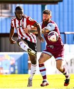 24 October 2021; James Akintunde of Derry City in action against Gary Deegan of Drogheda United during the SSE Airtricity League Premier Division match between Drogheda United and Derry City at United Park in Drogheda, Louth. Photo by Ramsey Cardy/Sportsfile
