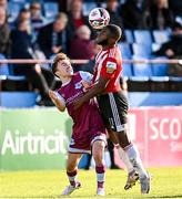 24 October 2021; James Akintunde of Derry City in action against Darragh Markey of Drogheda United during the SSE Airtricity League Premier Division match between Drogheda United and Derry City at United Park in Drogheda, Louth. Photo by Ramsey Cardy/Sportsfile