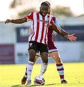 24 October 2021; James Akintunde of Derry City in action against Gary Deegan of Drogheda United during the SSE Airtricity League Premier Division match between Drogheda United and Derry City at United Park in Drogheda, Louth. Photo by Ramsey Cardy/Sportsfile