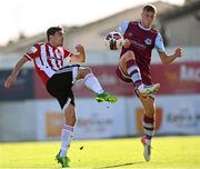 24 October 2021; Joe Thomson of Derry City in action against Killian Phillips of Drogheda United during the SSE Airtricity League Premier Division match between Drogheda United and Derry City at United Park in Drogheda, Louth. Photo by Ramsey Cardy/Sportsfile