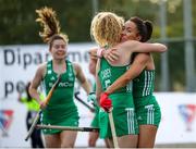 24 October 2021; Anna O'Flanagan of Ireland celebrates with team-mate Michelle Carey after scoring her side's first goal during the FIH Women's World Cup European Qualifier Final match between Ireland and Wales at Pisa in Italy. Photo by Roberto Bregani/Sportsfile