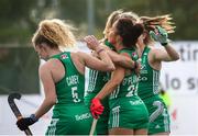 24 October 2021; Anna O'Flanagan of Ireland is congratulated by team-mates after scoring her side's first goal during the FIH Women's World Cup European Qualifier Final match between Ireland and Wales at Pisa in Italy. Photo by Roberto Bregani/Sportsfile