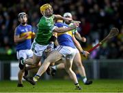 24 October 2021; Oisín O'Reilly of Kilmallock is fouled by Seánie O'Brien of Patrickswell during the Limerick County Senior Club Hurling Championship Final match between Kilmallock and Patrickswell at TUS Gaelic Grounds in Limerick. Photo by Piaras Ó Mídheach/Sportsfile