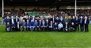 24 October 2021; Members and representatives of the 1996 Limerick hurling team, back row, from left, Dave Mahedy Trainer, Joe Quaid Feohanagh, John Kiely Galbally, Declan Nash South Liberties, Mark Foley Adare, Mike Nash South Liberties, Gary Kirby Patrickswell, Barry Foley Patrickswell, Owen O Neill, Murroe Boher, TJ Ryan Garryspillane, John O Brien Bruree, Frankie Carroll Garryspillane, Davy Clarke Kilmallock, Turlough Herbert Ahane, John Flavin Monagea, Tadgh Hayes Doon, Jimmy Hartigan Ballybrown Secretary County Board, Liam Lenihan Tournafulla Selector, Mike Fitzgerald Kilmallock County Board Treasurer, Tom Bennis Representing Sean Murray Snr Old Christians, front row, from left, Cora Fenton Blackrock Physio, Jimmy Hourigan, Pallasgreen, Conor Madigan Croagh Kilfinny, Mike Houlihan Kilmallock, Stephen McDonagh Bruree, Ciaran Carey Captain Patrickswell, Tom Ryan Manager Ballybrown, Mike Galligan Claughaun, Padraig Tobin Kilmallock, Charles Hanely Croagh Kilfinny, Liaison Officer, Paddy Coleman Doon, Brian Tobin Mungret St Pauls, Siobhan Ryan Garryspillane Representing JP Ryan (JAP), Brian Foley Representing Jack Foley Adare and Bernie Savage, Kilmallock Selector, after being introduced to the crowd before the Limerick County Senior Club Hurling Championship Final match between Kilmallock and Patrickswell at TUS Gaelic Grounds in Limerick. Photo by Piaras Ó Mídheach/Sportsfile