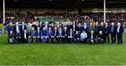 24 October 2021; Members and representatives of the 1996 Limerick hurling team, back row, from left, Dave Mahedy Trainer, Joe Quaid Feohanagh, John Kiely Galbally, Declan Nash South Liberties, Mark Foley Adare, Mike Nash South Liberties, Gary Kirby Patrickswell, Barry Foley Patrickswell, Owen O Neill, Murroe Boher, TJ Ryan Garryspillane, John O Brien Bruree, Frankie Carroll Garryspillane, Davy Clarke Kilmallock, Turlough Herbert Ahane, John Flavin Monagea, Tadgh Hayes Doon, Jimmy Hartigan Ballybrown Secretary County Board, Liam Lenihan Tournafulla Selector, Mike Fitzgerald Kilmallock County Board Treasurer, Tom Bennis Representing Sean Murray Snr Old Christians, front row, from left, Cora Fenton Blackrock Physio, Jimmy Hourigan, Pallasgreen, Conor Madigan Croagh Kilfinny, Mike Houlihan Kilmallock, Stephen McDonagh Bruree, Ciaran Carey Captain Patrickswell, Tom Ryan Manager Ballybrown, Mike Galligan Claughaun, Padraig Tobin Kilmallock, Charles Hanely Croagh Kilfinny, Liaison Officer, Paddy Coleman Doon, Brian Tobin Mungret St Pauls, Siobhan Ryan Garryspillane Representing JP Ryan (JAP), Brian Foley Representing Jack Foley Adare and Bernie Savage, Kilmallock Selector, after being introduced to the crowd before the Limerick County Senior Club Hurling Championship Final match between Kilmallock and Patrickswell at TUS Gaelic Grounds in Limerick. Photo by Piaras Ó Mídheach/Sportsfile