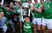 24 October 2021; JJ Gantley, son of Kilmallock selector Rory Gantley, celebrates with the cup after the Limerick County Senior Club Hurling Championship Final match between Kilmallock and Patrickswell at TUS Gaelic Grounds in Limerick. Photo by Piaras Ó Mídheach/Sportsfile