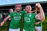 24 October 2021; Kilmallock players Paudie O'Brien, left, and Oisín O'Reilly celebrate after their side's victory in the Limerick County Senior Club Hurling Championship Final match between Kilmallock and Patrickswell at TUS Gaelic Grounds in Limerick. Photo by Piaras Ó Mídheach/Sportsfile