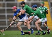 24 October 2021; Tom O'Brien of Patrickswell in action against Philip O'Loughlin and Dan Joy, right, of Kilmallock during the Limerick County Senior Club Hurling Championship Final match between Kilmallock and Patrickswell at TUS Gaelic Grounds in Limerick. Photo by Piaras Ó Mídheach/Sportsfile