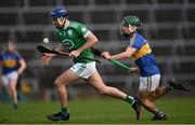 24 October 2021; Dan Joy of Kilmallock in action against Patrick Kirby of Patrickswell during the Limerick County Senior Club Hurling Championship Final match between Kilmallock and Patrickswell at TUS Gaelic Grounds in Limerick. Photo by Piaras Ó Mídheach/Sportsfile