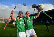 24 October 2021; Kilmallock players Mark O'Loughlin, left, and Oisín O'Reilly celebrate after their side's victory in the Limerick County Senior Club Hurling Championship Final match between Kilmallock and Patrickswell at TUS Gaelic Grounds in Limerick. Photo by Piaras Ó Mídheach/Sportsfile